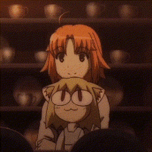 Animated Neco-Arc in a warm theater scene